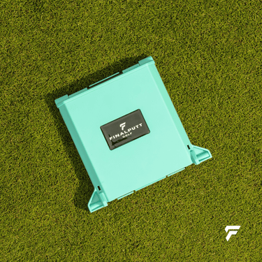 Yips Blocker folded flat on the grass